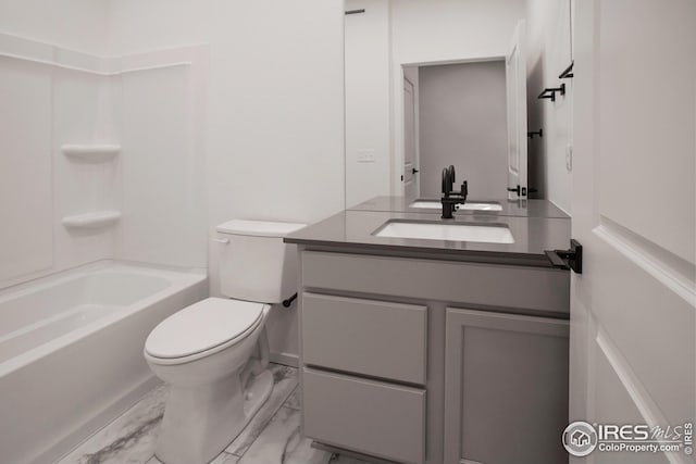 full bathroom featuring vanity, shower / bathtub combination, and toilet