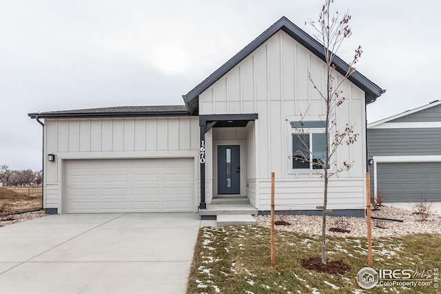 modern inspired farmhouse featuring a garage