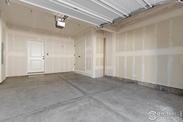 garage featuring a garage door opener