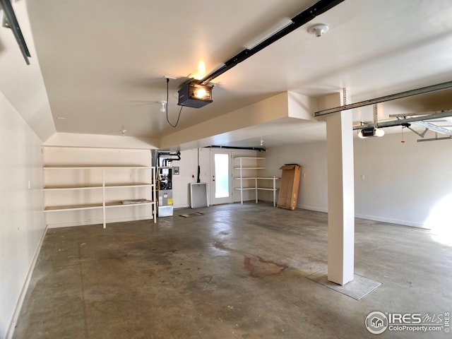 garage featuring a garage door opener