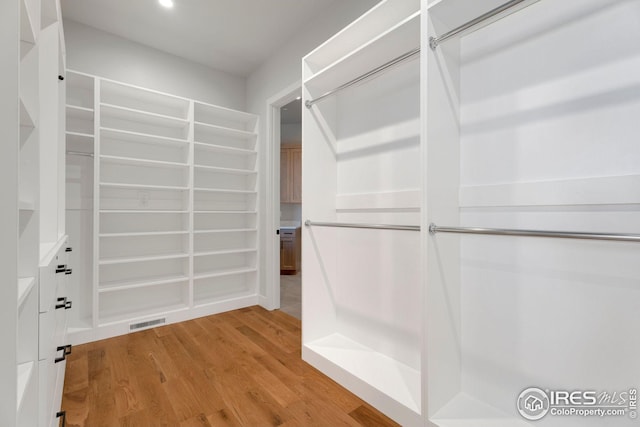 spacious closet with visible vents and light wood finished floors
