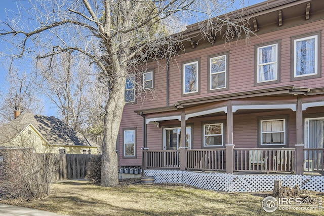 back of house with a yard