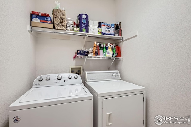 laundry area with separate washer and dryer