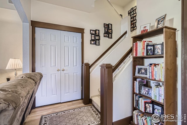 foyer entrance with light wood-type flooring