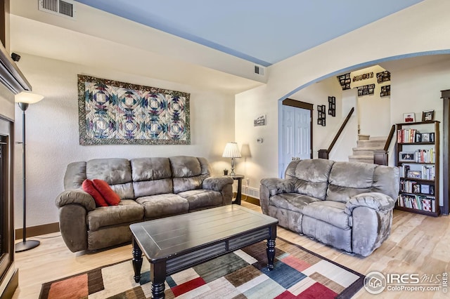 living room featuring wood-type flooring