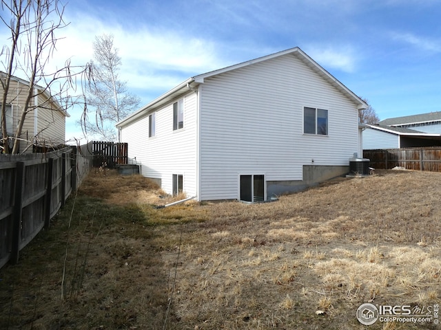 view of property exterior with central AC unit