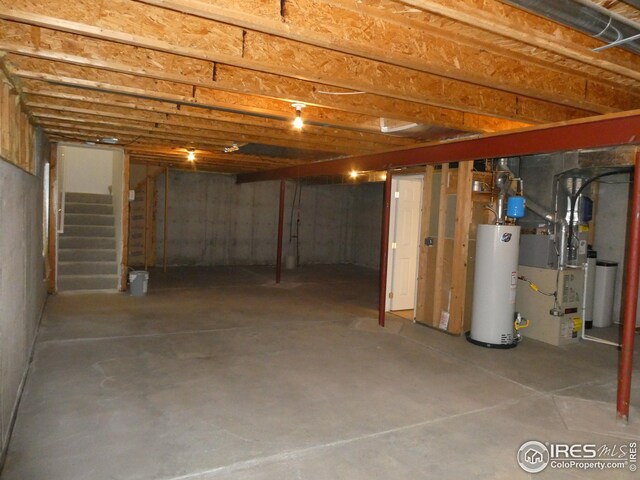 basement featuring gas water heater