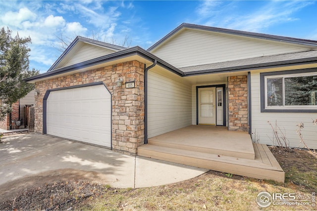 single story home featuring a garage