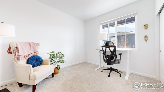 carpeted office with baseboards