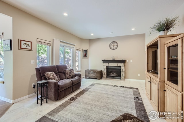 living room featuring a fireplace
