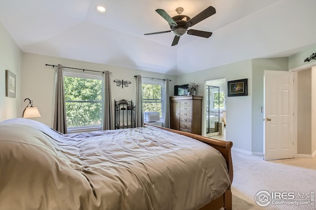 carpeted bedroom featuring vaulted ceiling and ceiling fan