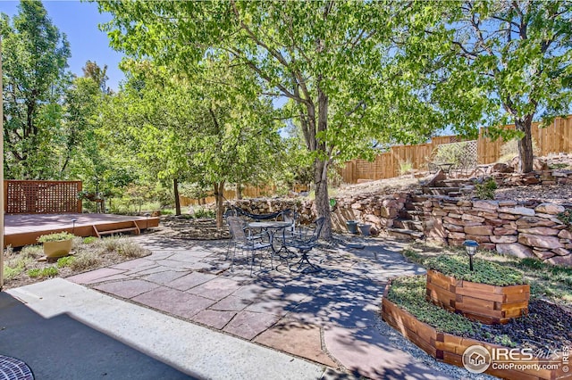 view of patio / terrace featuring a wooden deck