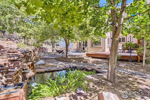 view of yard featuring a deck
