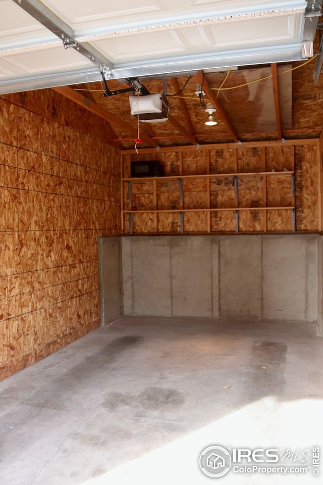 garage featuring a garage door opener