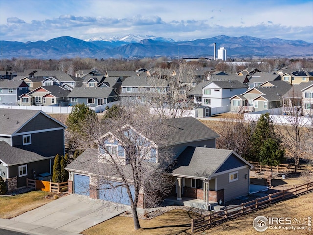 drone / aerial view featuring a mountain view