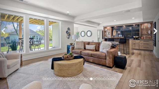 3806 Bridle Ridge Cir, Severance, CO 80524 - living area featuring light wood-style floors and recessed lighting