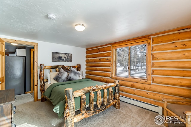 carpeted bedroom with rustic walls, a baseboard heating unit, and baseboards