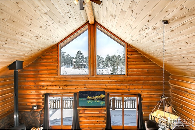 detailed view of wooden ceiling, log walls, ceiling fan, and beam ceiling