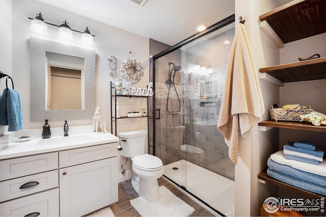 kitchen with a sink, light countertops, backsplash, open shelves, and light wood finished floors