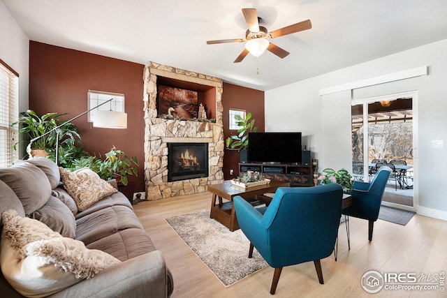 dining room with baseboards, light wood finished floors, visible vents, and an inviting chandelier