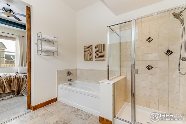 ensuite bathroom featuring ensuite bathroom, a ceiling fan, a bath, and a shower stall