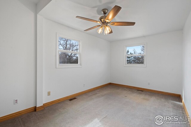 24525 County Road 53, Kersey, CO 80644 - carpeted empty room with a healthy amount of sunlight, baseboards, and visible vents