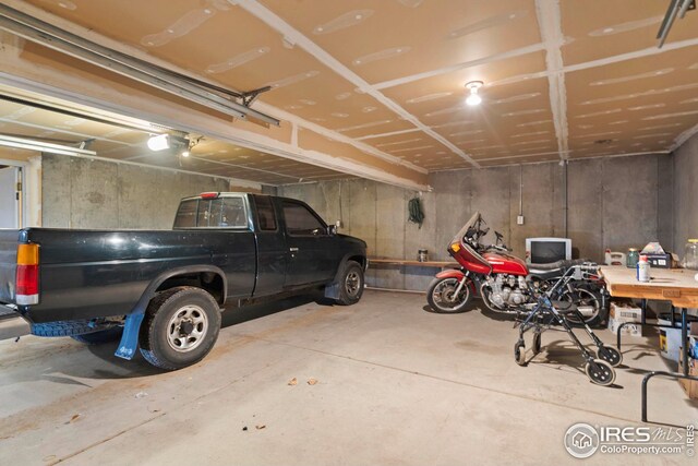 24525 County Road 53, Kersey, CO 80644 - garage featuring a garage door opener
