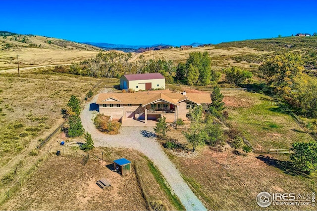 aerial view with a rural view and a mountain view