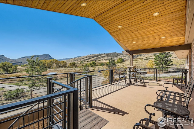 balcony featuring a mountain view