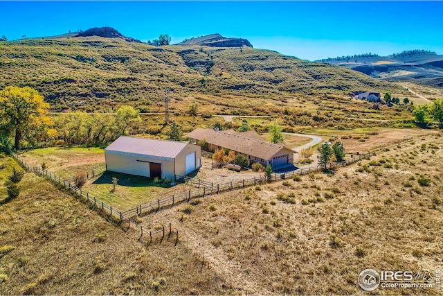 drone / aerial view with a rural view and a mountain view