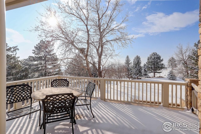 8400 Middle Fork Rd, Boulder, CO 80302 - snow covered deck featuring outdoor dining area