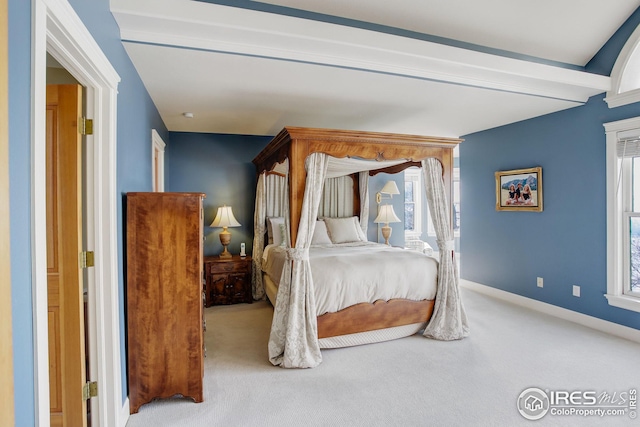 8400 Middle Fork Rd, Boulder, CO 80302 - bedroom with baseboards, beamed ceiling, and light colored carpet