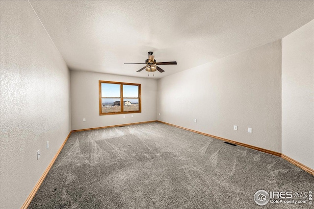 11837 County Road 39, Fort Lupton, CO 80621 - carpeted spare room with a ceiling fan and baseboards