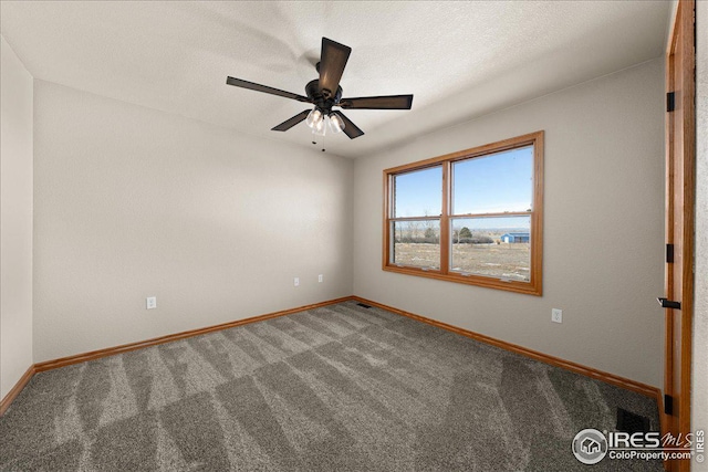 11837 County Road 39, Fort Lupton, CO 80621 - carpeted spare room with baseboards and ceiling fan