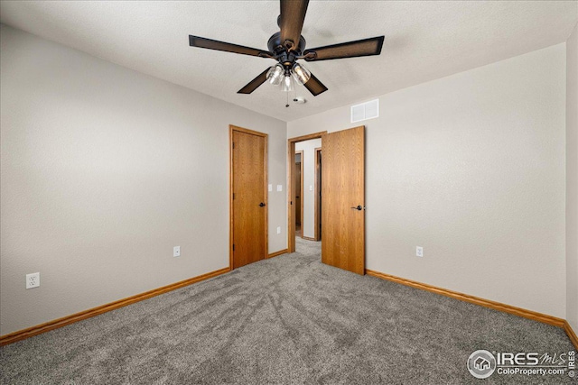 11837 County Road 39, Fort Lupton, CO 80621 - empty room featuring carpet flooring and ceiling fan