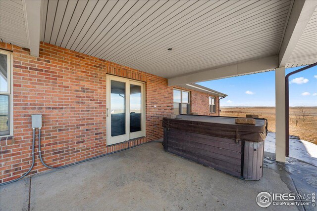 11837 County Road 39, Fort Lupton, CO 80621 - view of patio featuring a hot tub