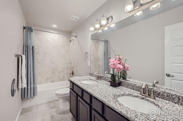 bathroom with double vanity, shower / tub combo, a sink, and visible vents