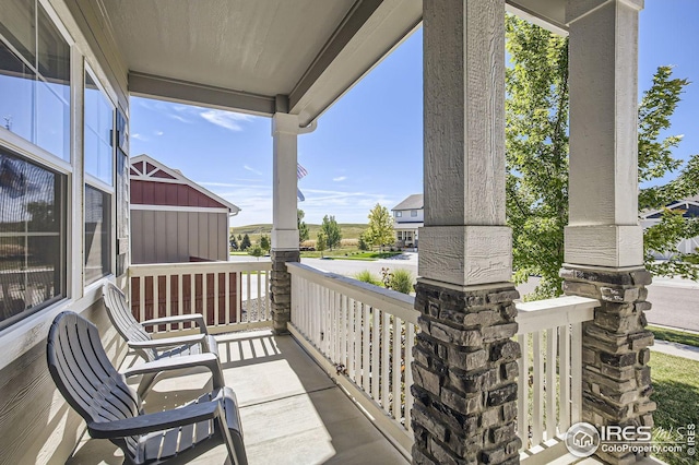 balcony featuring covered porch