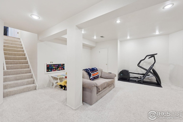 interior space featuring carpet floors, visible vents, and recessed lighting