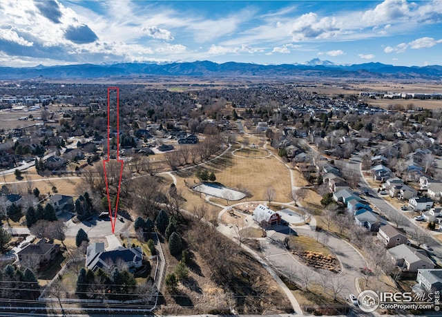 aerial view featuring a residential view and a mountain view