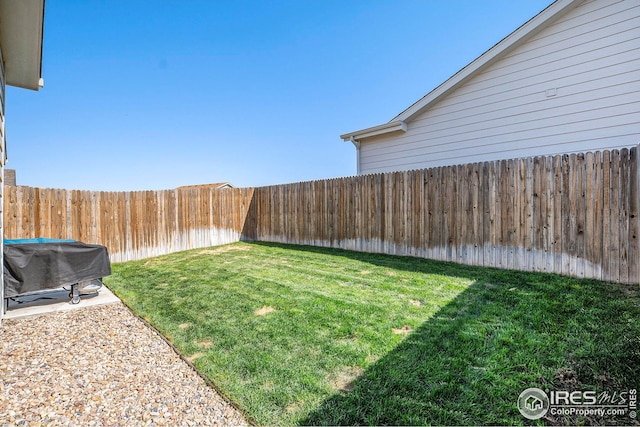 view of yard featuring a fenced backyard