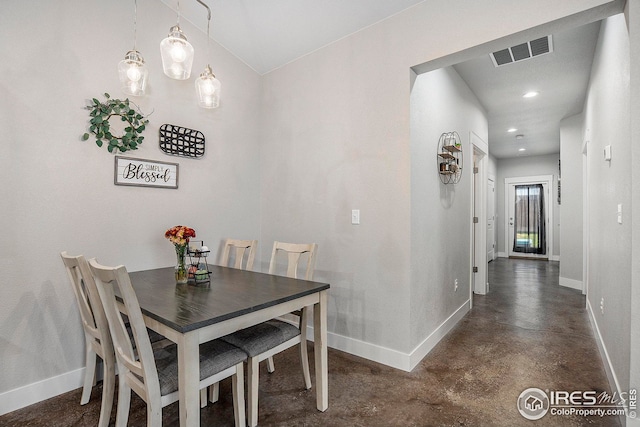 dining room with recessed lighting, visible vents, concrete floors, and baseboards