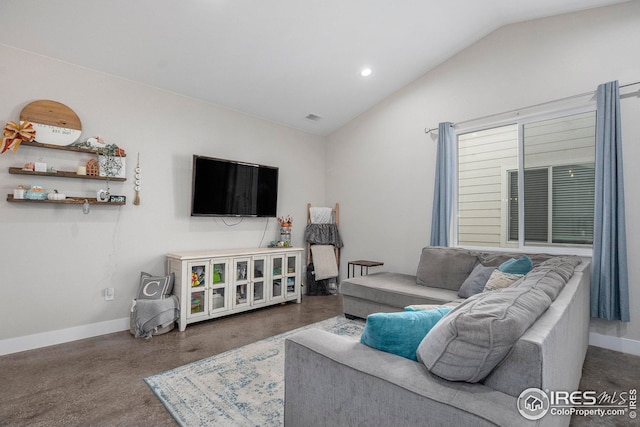 living room with lofted ceiling, visible vents, concrete floors, and baseboards