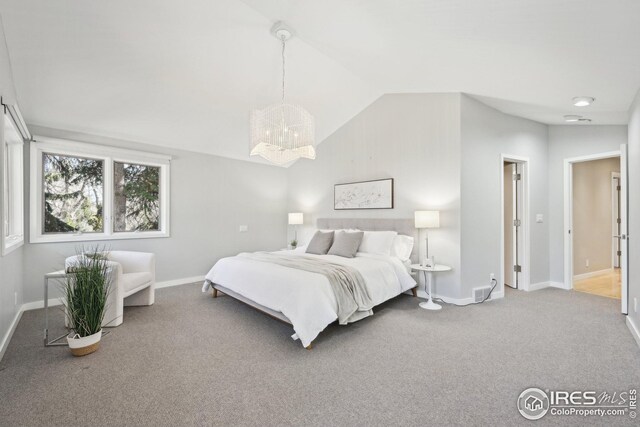 503 Kalmia Ave, Boulder, CO 80304 - bedroom with lofted ceiling, a chandelier, carpet flooring, and baseboards