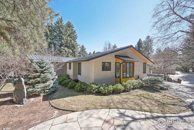 503 Kalmia Ave, Boulder, CO 80304 - view of front facade with a standing seam roof and metal roof