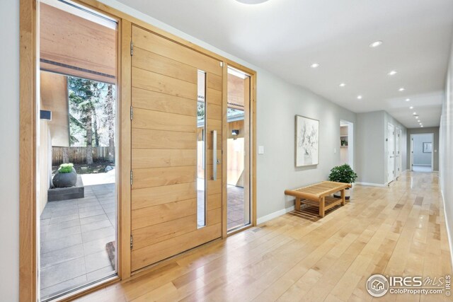 503 Kalmia Ave, Boulder, CO 80304 - entryway with baseboards, light wood finished floors, and recessed lighting