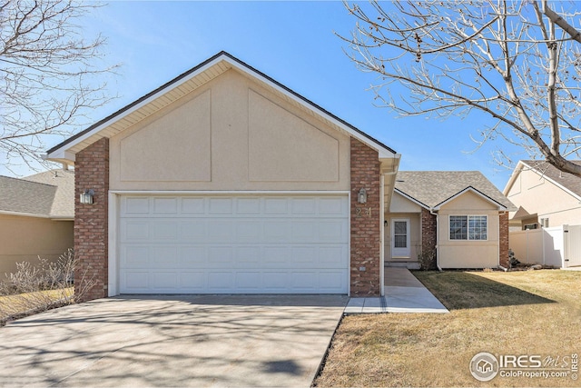 ranch-style house with a garage, brick siding, fence, driveway, and a front yard