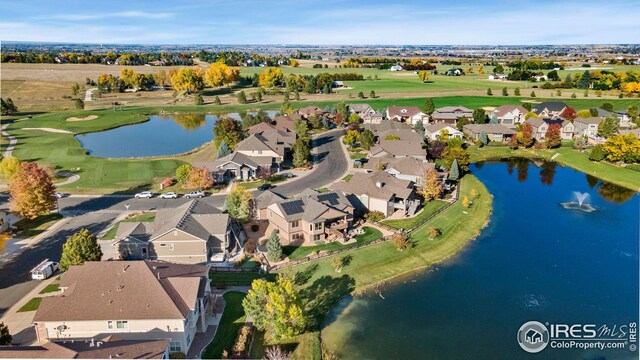 birds eye view of property featuring a residential view, a water view, and golf course view