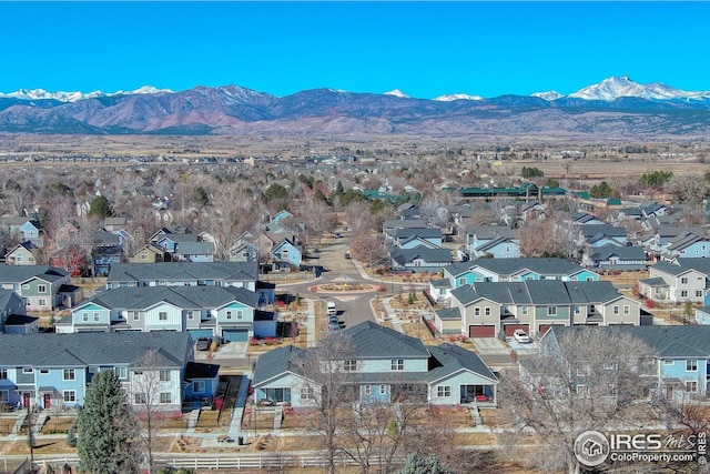 birds eye view of property featuring a residential view and a mountain view