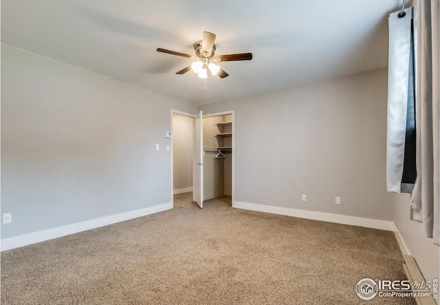 unfurnished bedroom with light carpet and baseboards